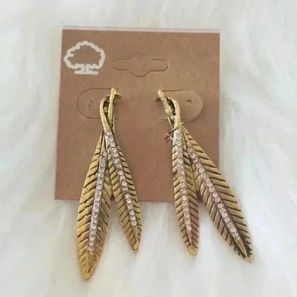 Gold toned rindstone feather earrings